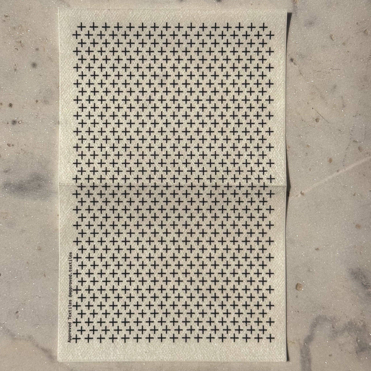 Approved Textiles stitch practice transfers with 5 mm grids and four patterns for parallel and staggered running stitches and crosses.