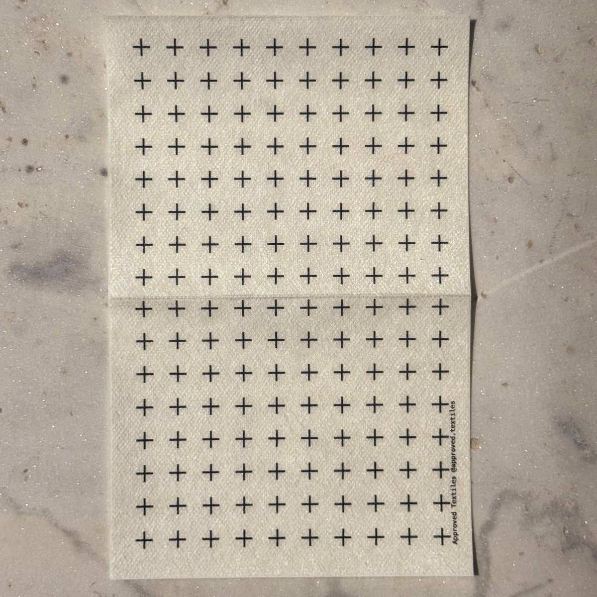 Approved Textiles stitch practice transfers with 5 mm grids and four patterns for parallel and staggered running stitches and crosses.