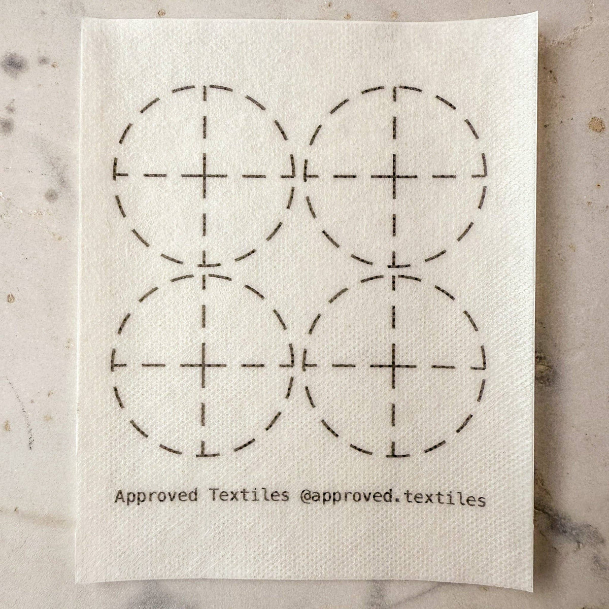 Approved Textiles Eva Hesse-inspired visible mending transfers featuring four geometric patterns with grids, loops, and interconnected lines.
