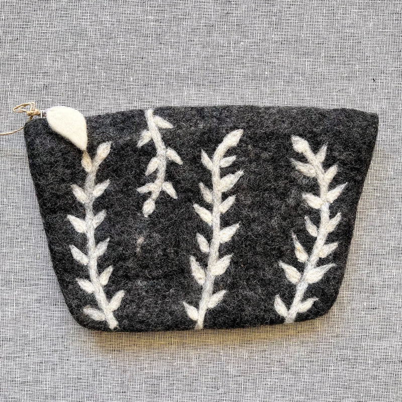 dark grey pouch with white vines