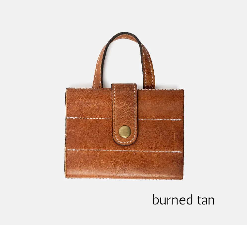 Re:designed Project 66 leather needle organizer in burned tan