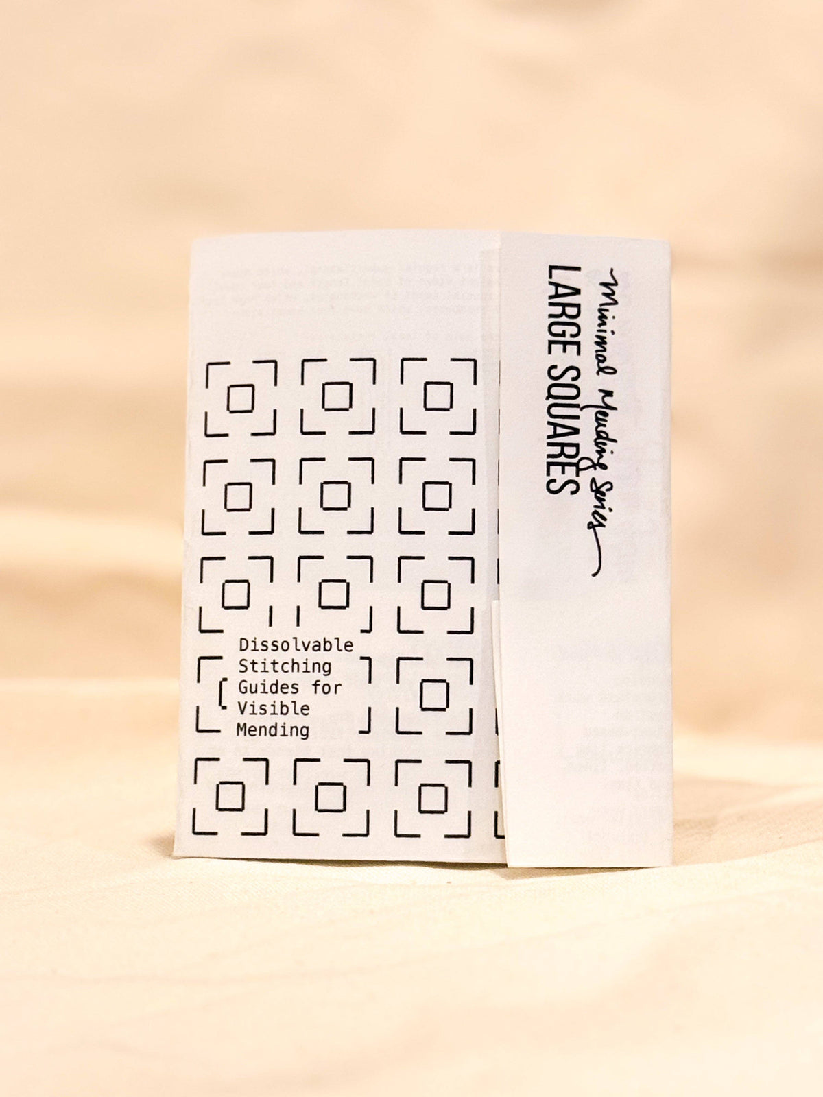 Approved Textiles Waffles visible mending transfers featuring geometric grid patterns inspired by the texture of a waffle.
