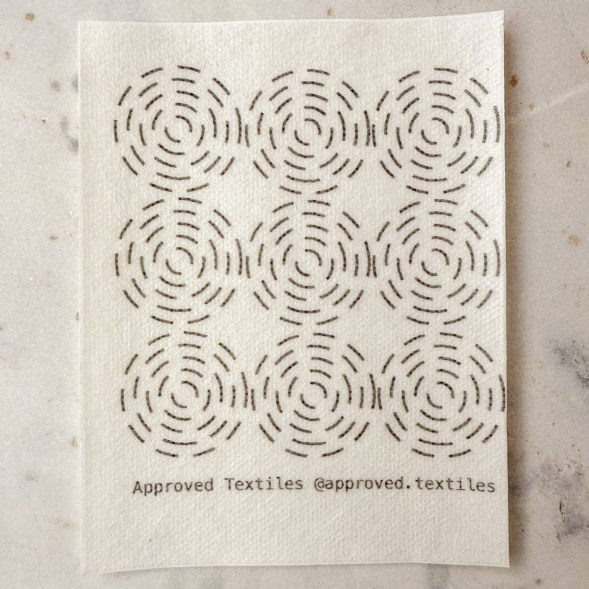 Approved Textiles Eva Hesse-inspired visible mending transfers featuring four geometric patterns with grids, loops, and interconnected lines.