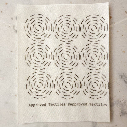 Approved Textiles Eva Hesse-inspired visible mending transfers featuring four geometric patterns with grids, loops, and interconnected lines.