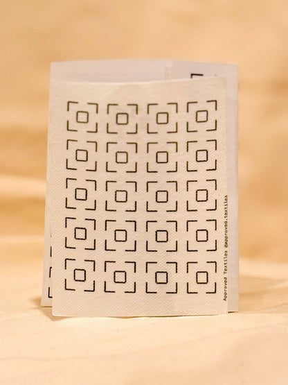 Approved Textiles Waffles visible mending transfers featuring geometric grid patterns inspired by the texture of a waffle.