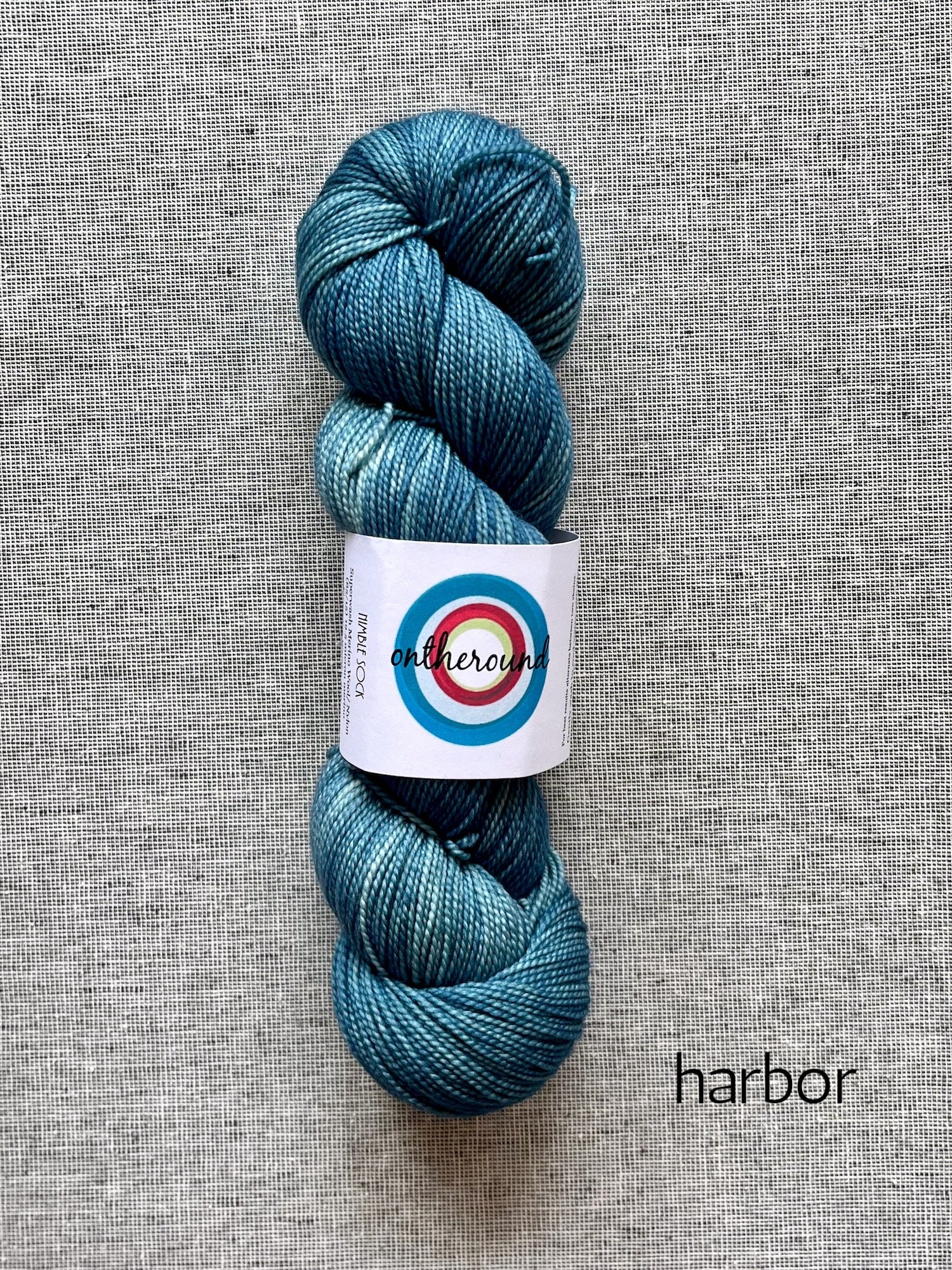 ontheround superwash merino  nimble sock yarn in harbor