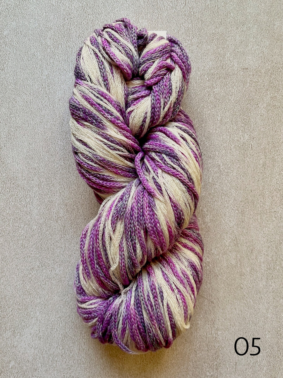 Plymouth Sea Glass worsted weight cotton and merino wool yarn, featuring softly blended colors and a textured chainette construction in color 05