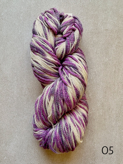 Plymouth Sea Glass worsted weight cotton and merino wool yarn, featuring softly blended colors and a textured chainette construction in color 05