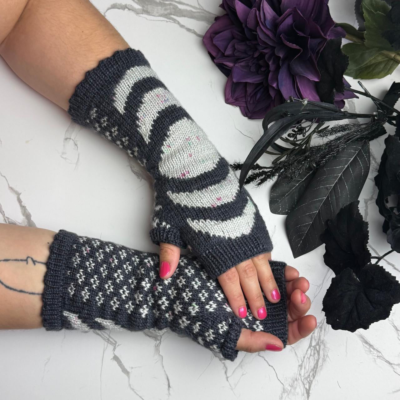 stranded colorwork fingerless mitts in a lunar phase motif.